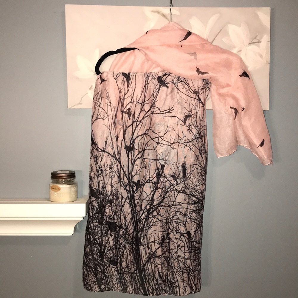 Silhouetted flowing scarf of birds and branches
